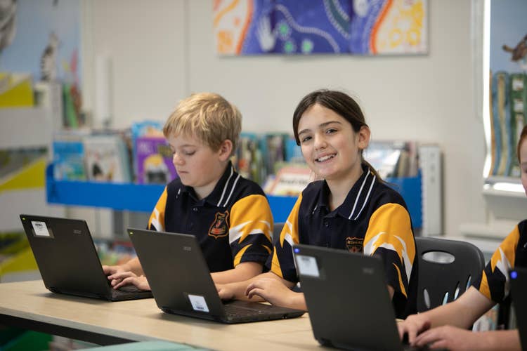 Students working on laptops