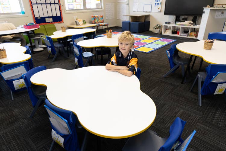 Student at desk.
