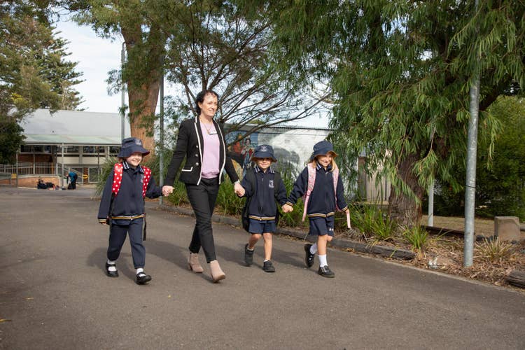 Principal walking in with 3 students