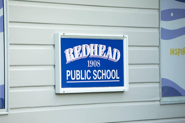 Redhead school sign